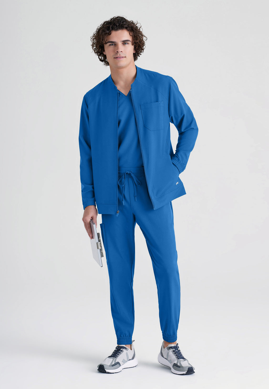 Full Body View of the Cycle 3-Pocket Crewneck Ciclo® Scrub Jacket in New Royal from Grey's Anatomy™ by Barco Evolve