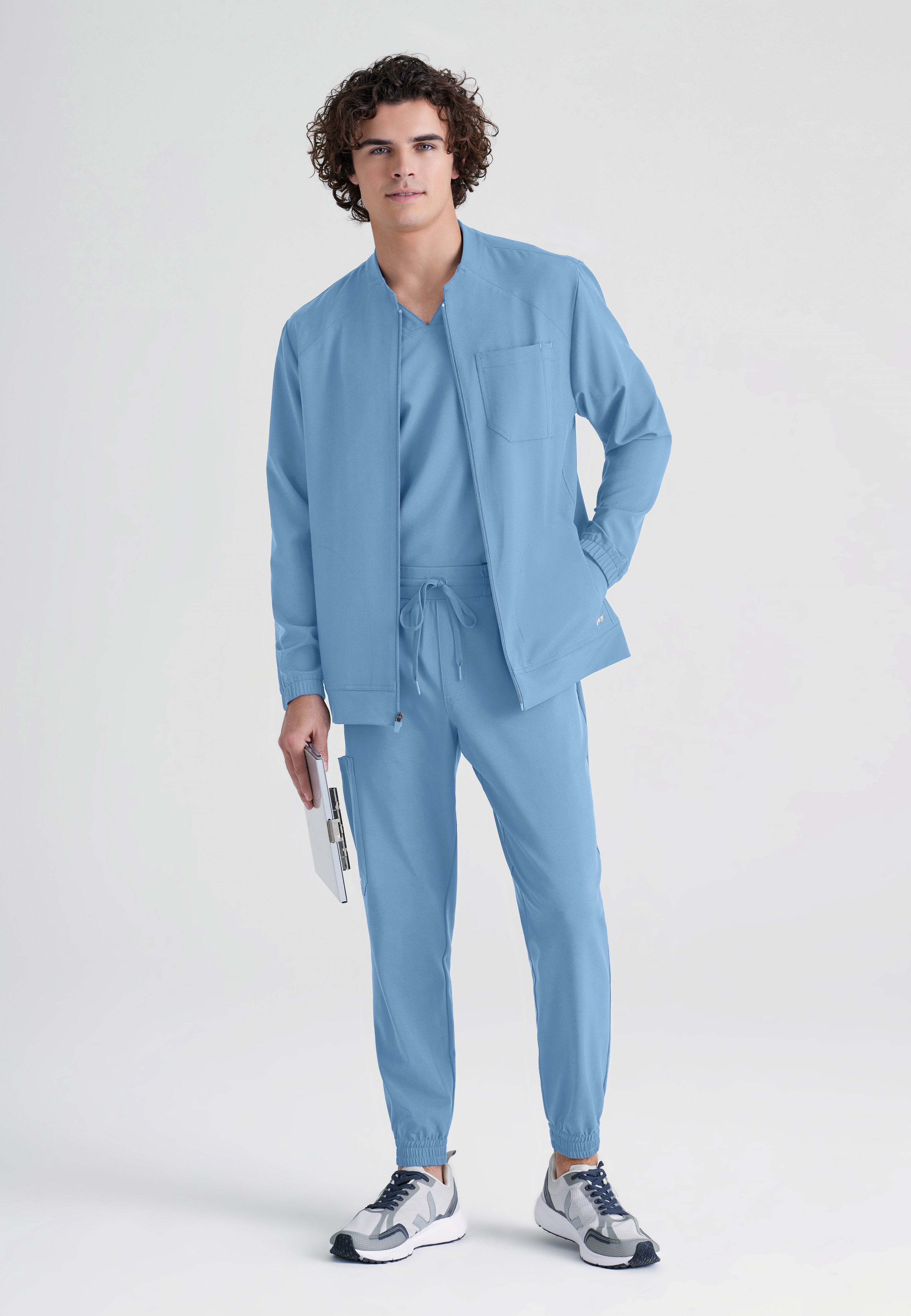 Full Body View of the Cycle 3-Pocket Crewneck Ciclo® Scrub Jacket in Ciel Blue from Grey's Anatomy™ by Barco Evolve