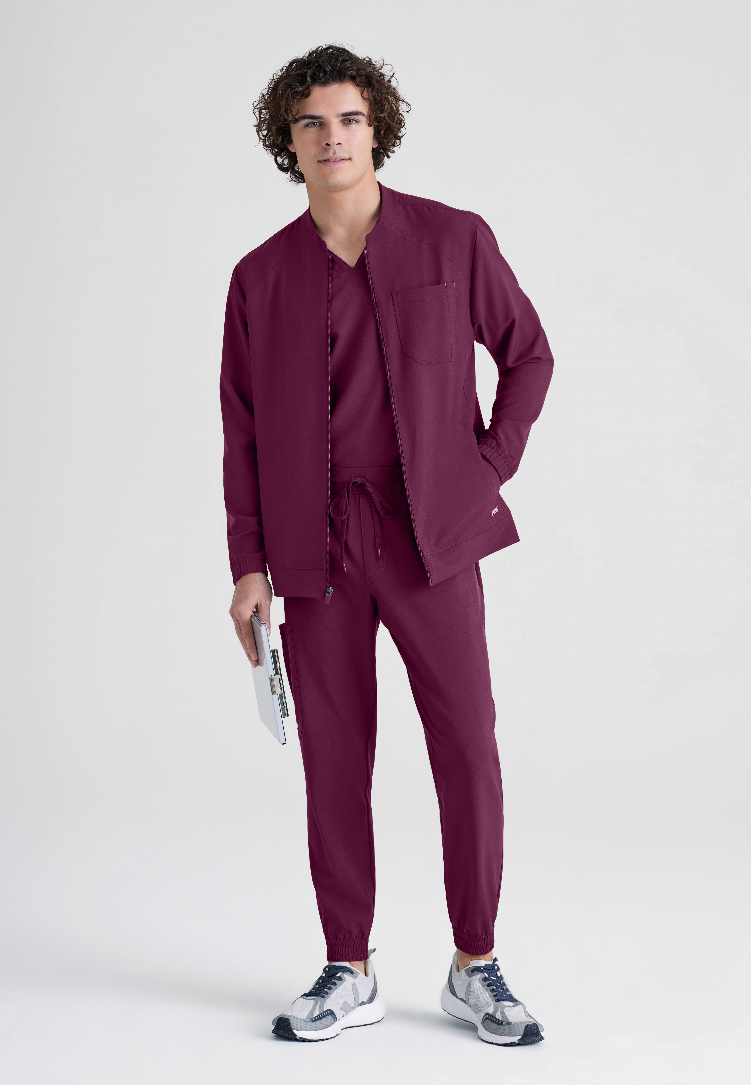 Full Body View of the Cycle 3-Pocket Crewneck Ciclo® Scrub Jacket in Wine from Grey's Anatomy™ by Barco Evolve