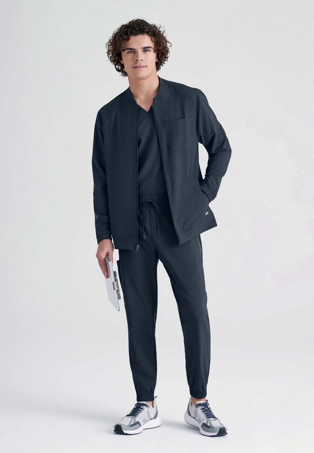 Full Body View of the Cycle 3-Pocket Crewneck Ciclo® Scrub Jacket in Steel from Grey's Anatomy™ by Barco Evolve