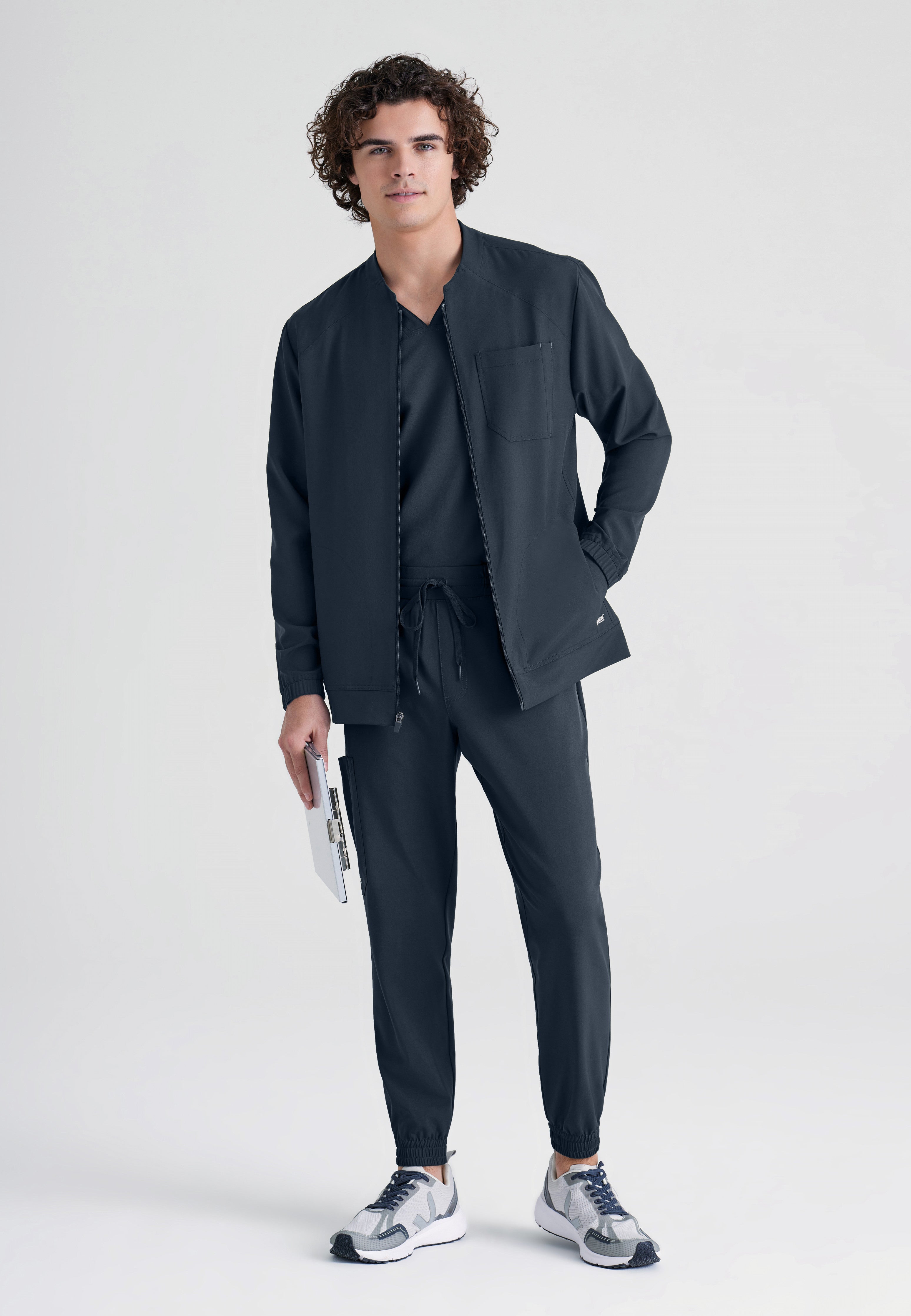 Full Body View of the Cycle 3-Pocket Crewneck Ciclo® Scrub Jacket in Steel from Grey's Anatomy™ by Barco Evolve