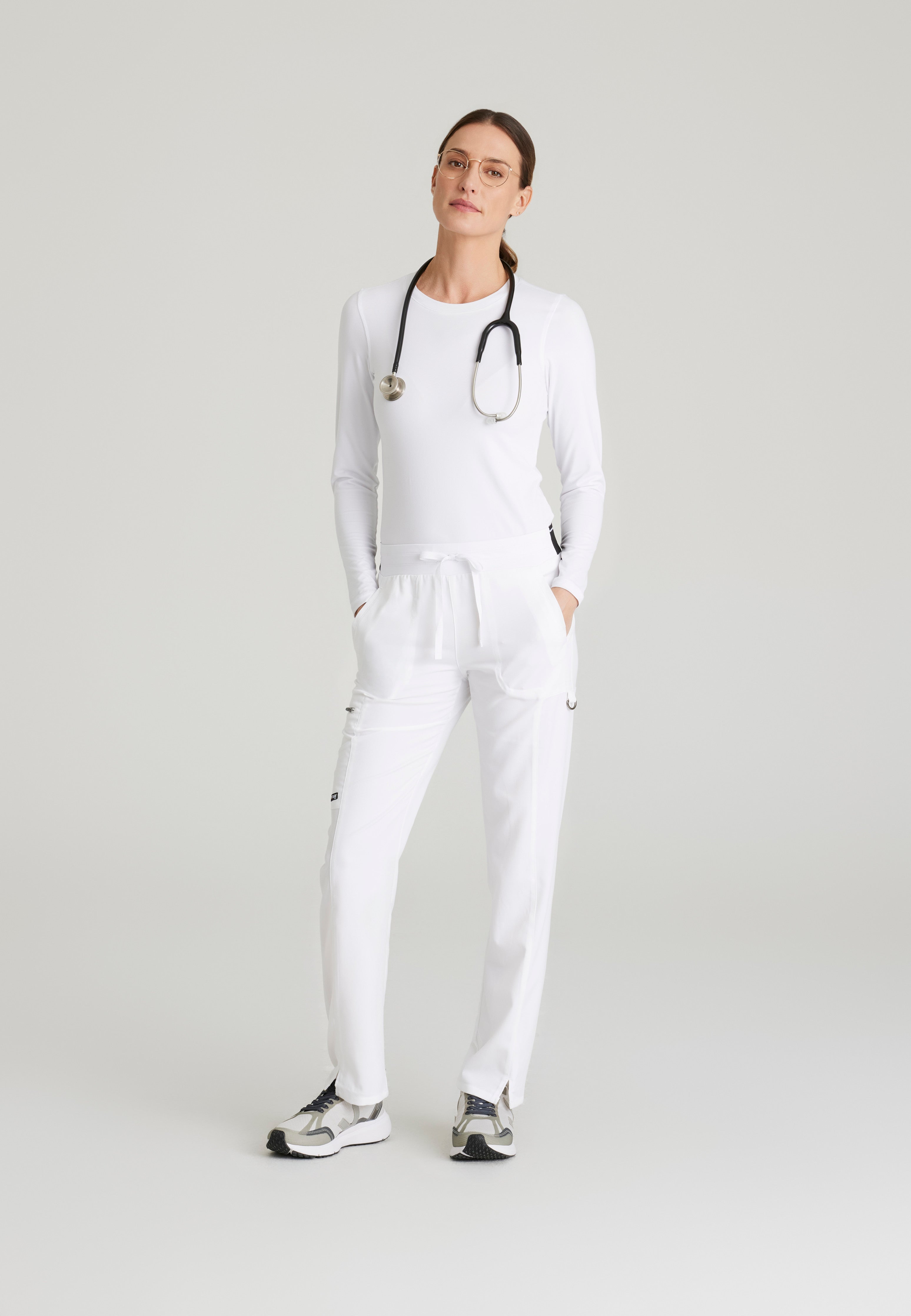Full Body View of the Kim 3-Pocket Mid-Rise Straight Leg Scrub Pant in White from Grey's Anatomy™ by Barco Spandex Stretch