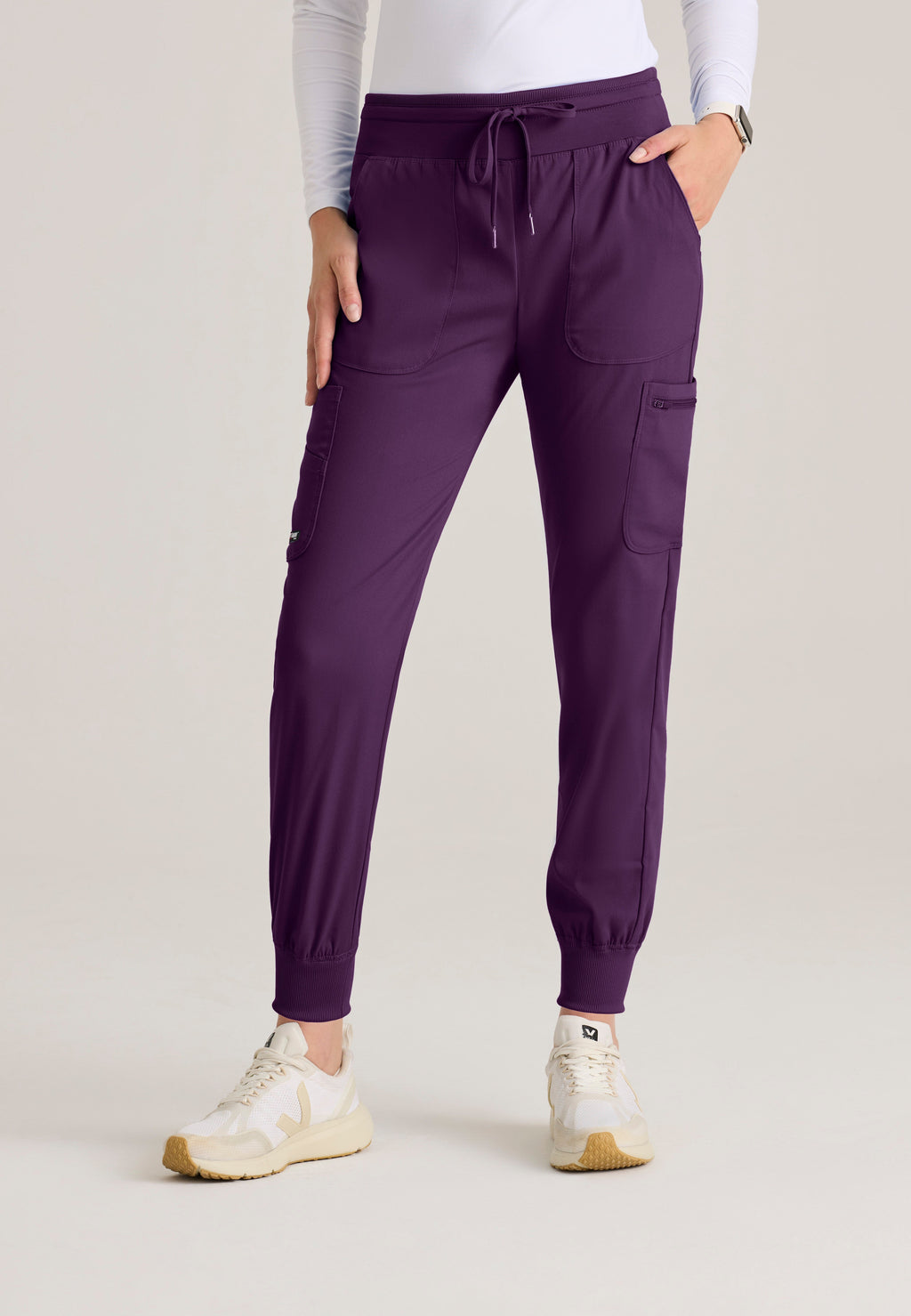 Front View of the Carly Jogger Scrub Pant in Eggplant from Grey's Anatomy™ by Barco Spandex Stretch