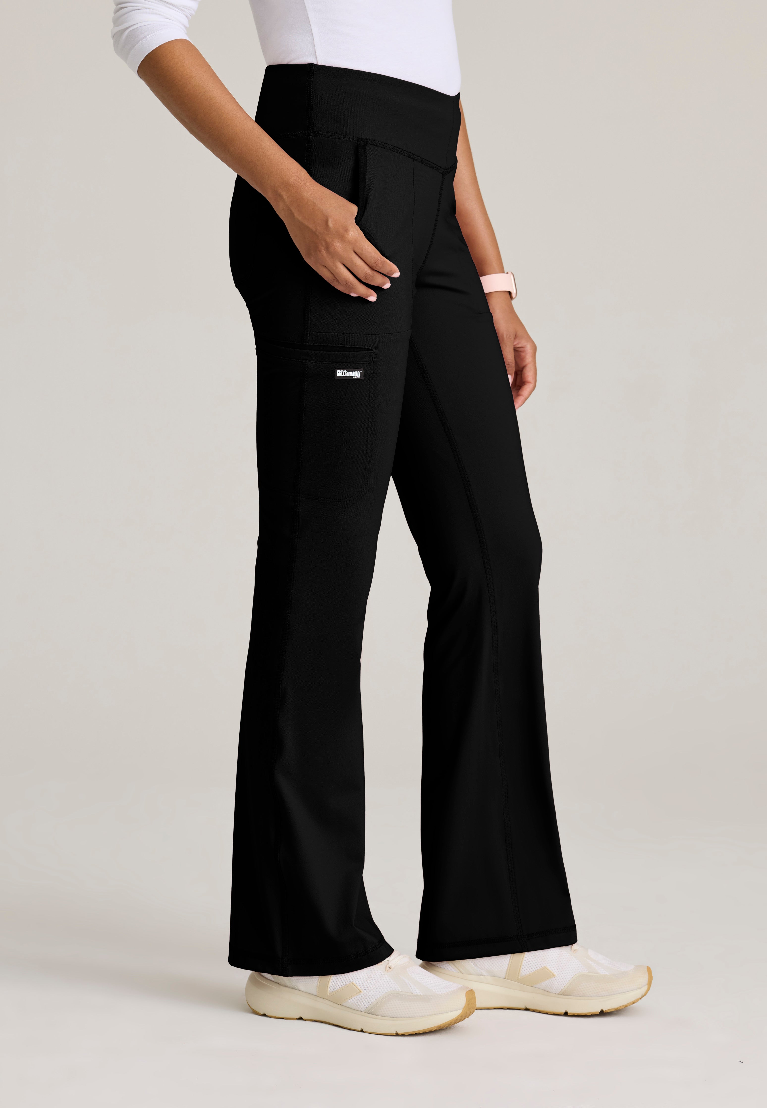 Side View of the Swift V-Front Knit Pant in Black from Grey's Anatomy™ by Barco Knit Stretch