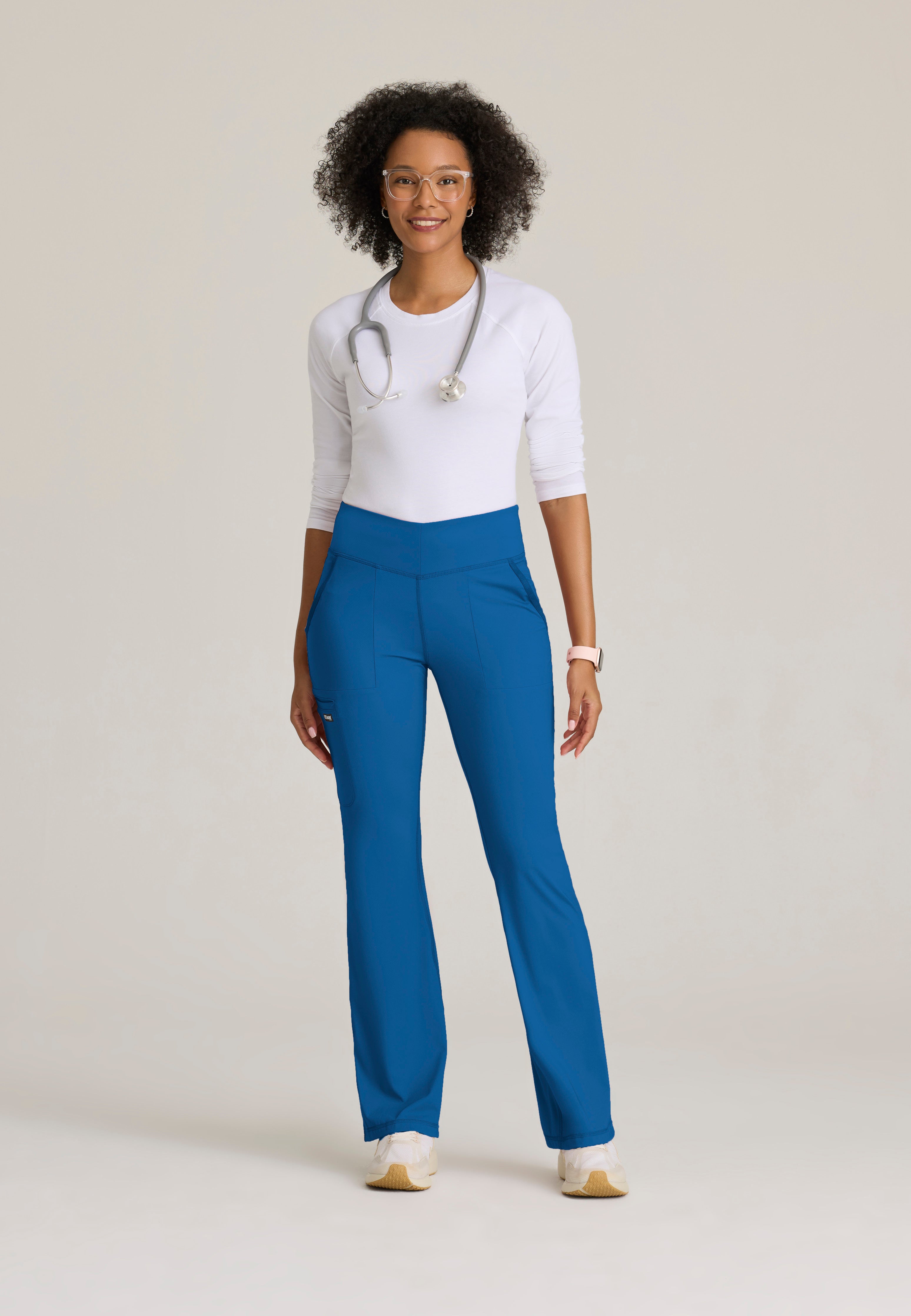 Full Body View of the Swift V-Front Knit Pant in New Royal from Grey's Anatomy™ by Barco Knit Stretch