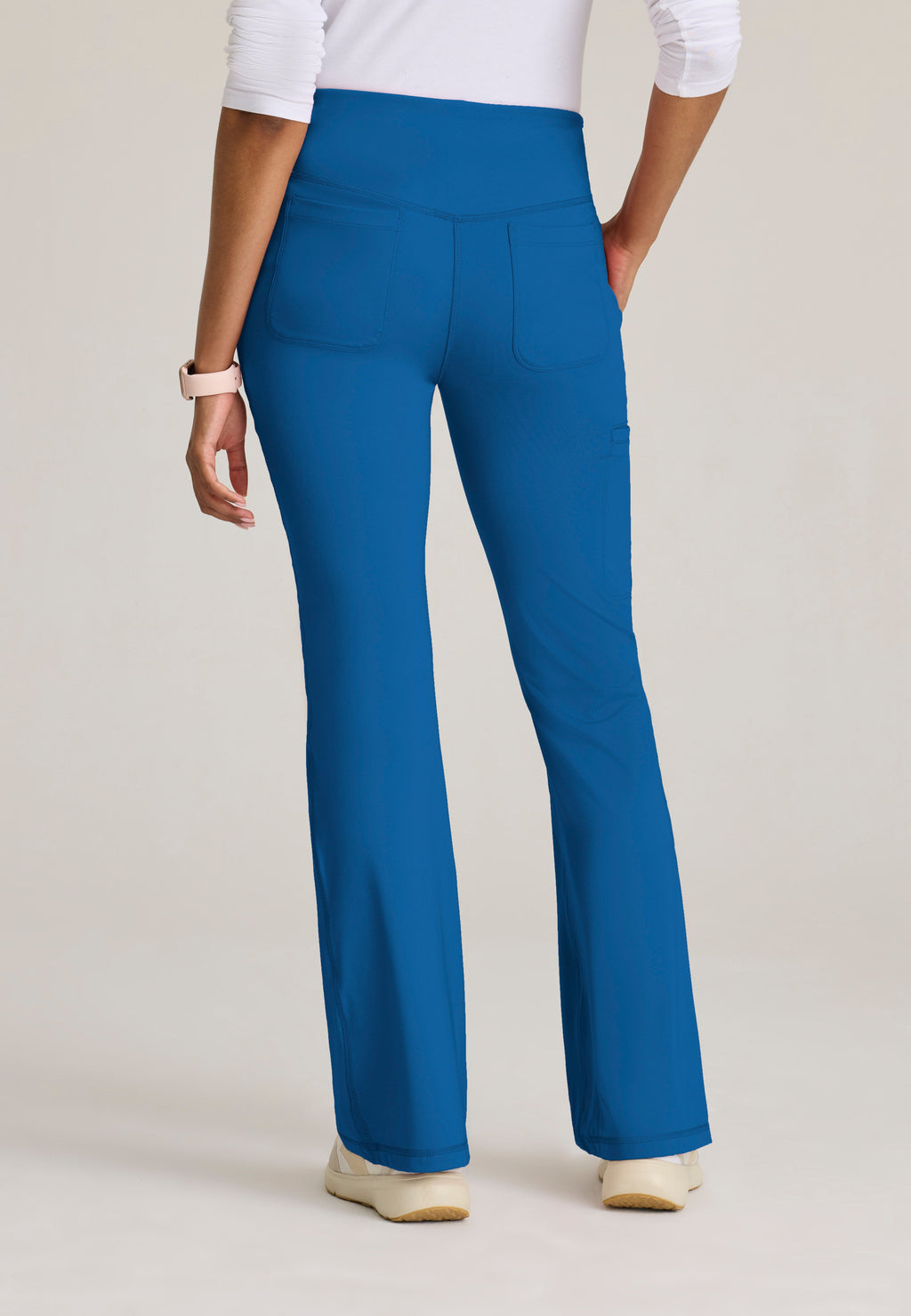 Back View of the Swift V-Front Knit Pant in New Royal from Grey's Anatomy™ by Barco Knit Stretch