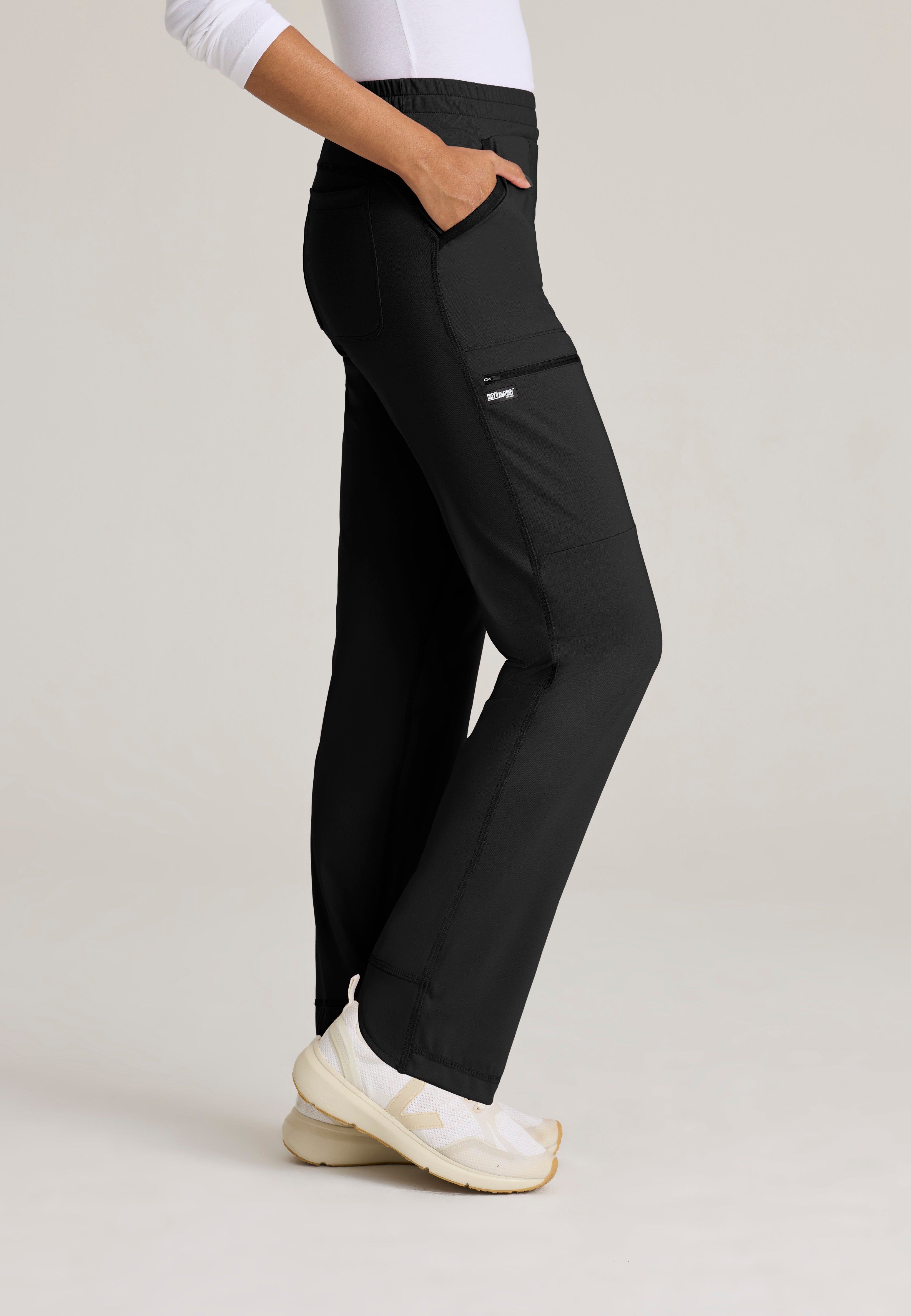 Side View of the Momentum Straight Leg Knit Pant in Black from Grey's Anatomy™ by Barco Knit Stretch