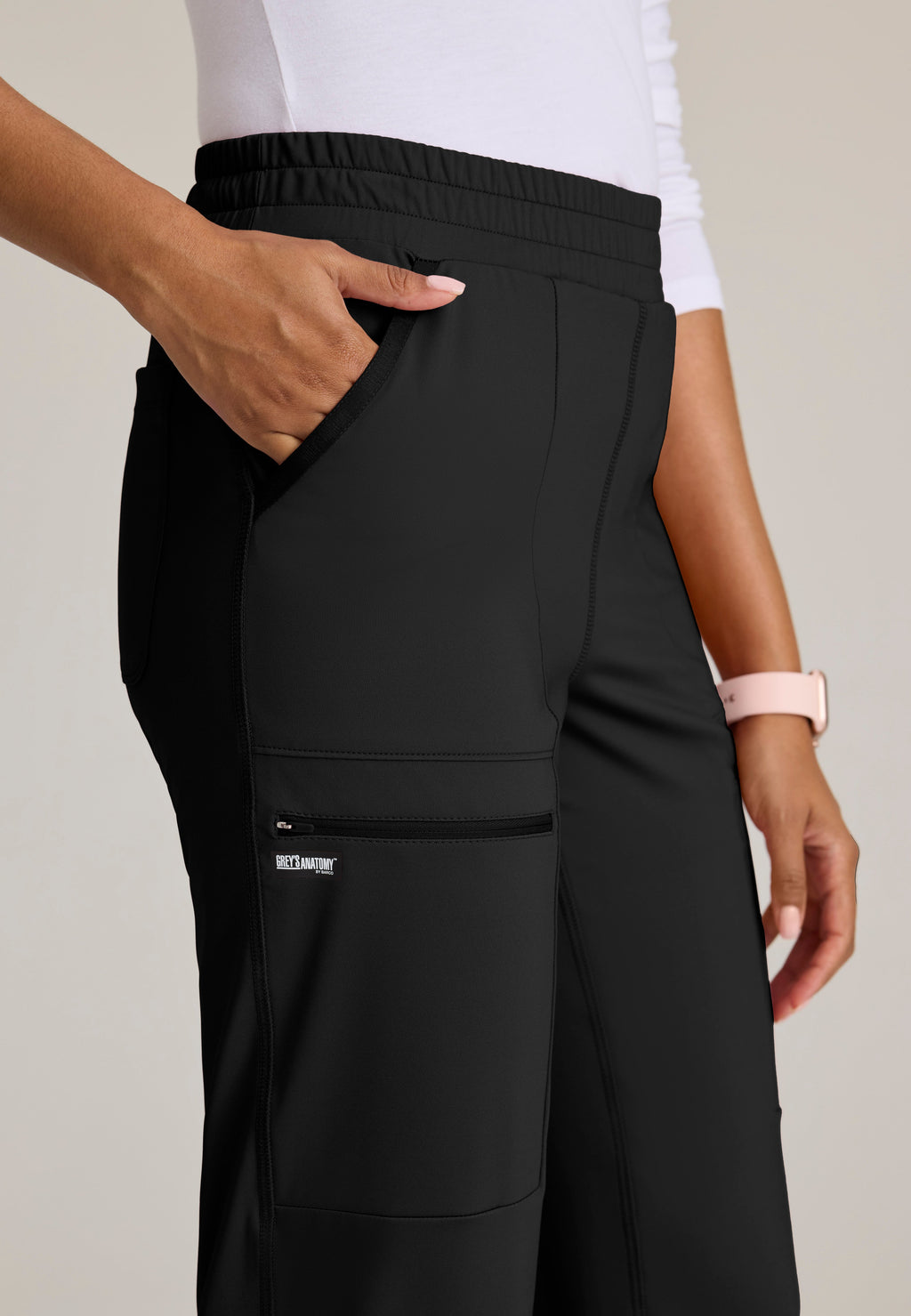 Detail Shot of the Momentum Straight Leg Knit Pant in Black from Grey's Anatomy™ by Barco Knit Stretch