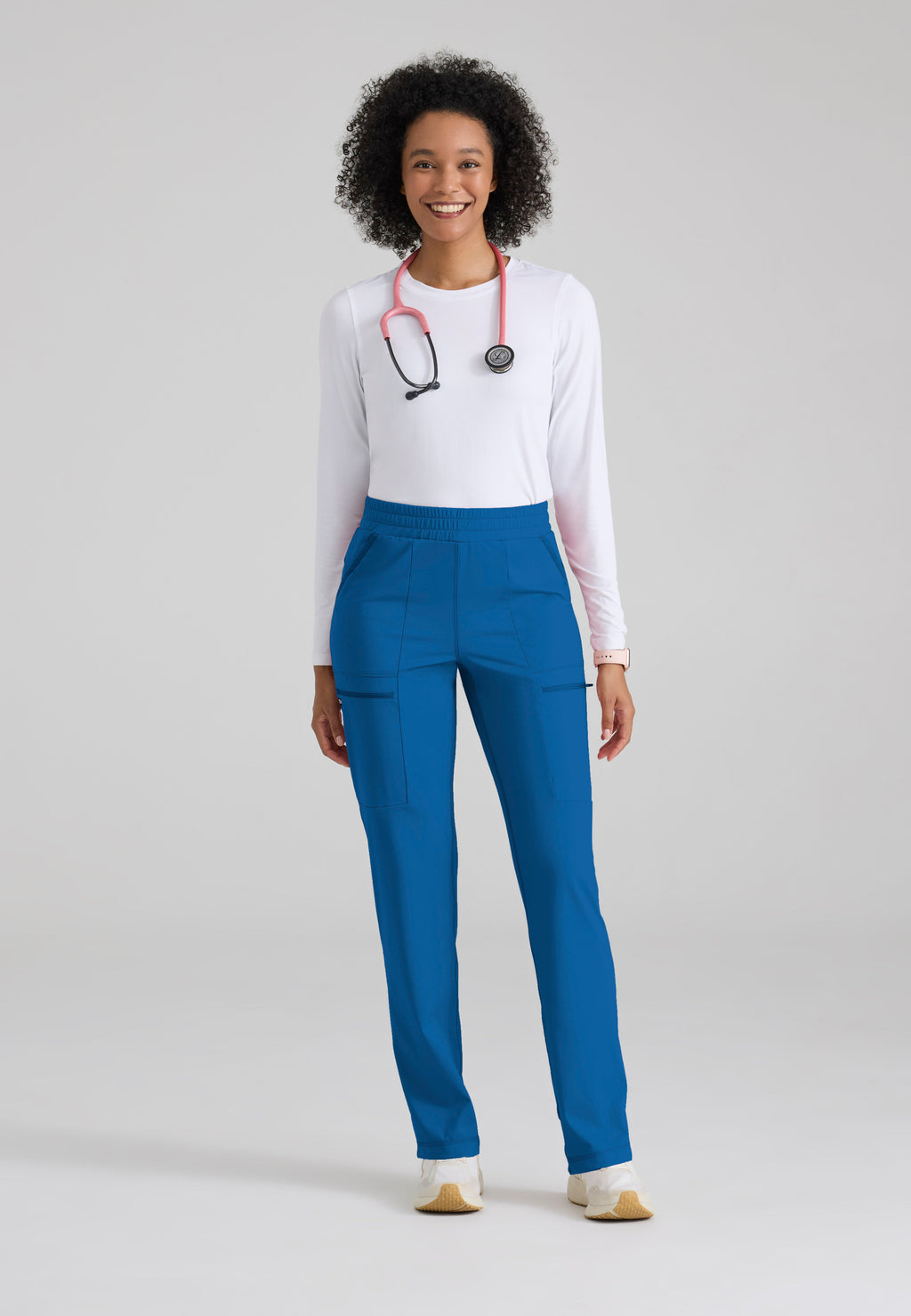 Full Body View of the Momentum Straight Leg Knit Pant in New Royal from Grey's Anatomy™ by Barco Knit Stretch