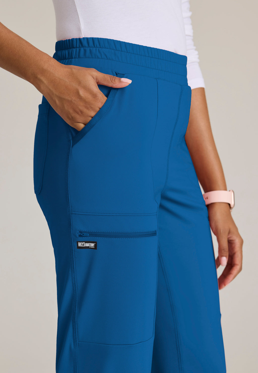 Detail Shot of the Momentum Straight Leg Knit Pant in New Royal from Grey's Anatomy™ by Barco Knit Stretch