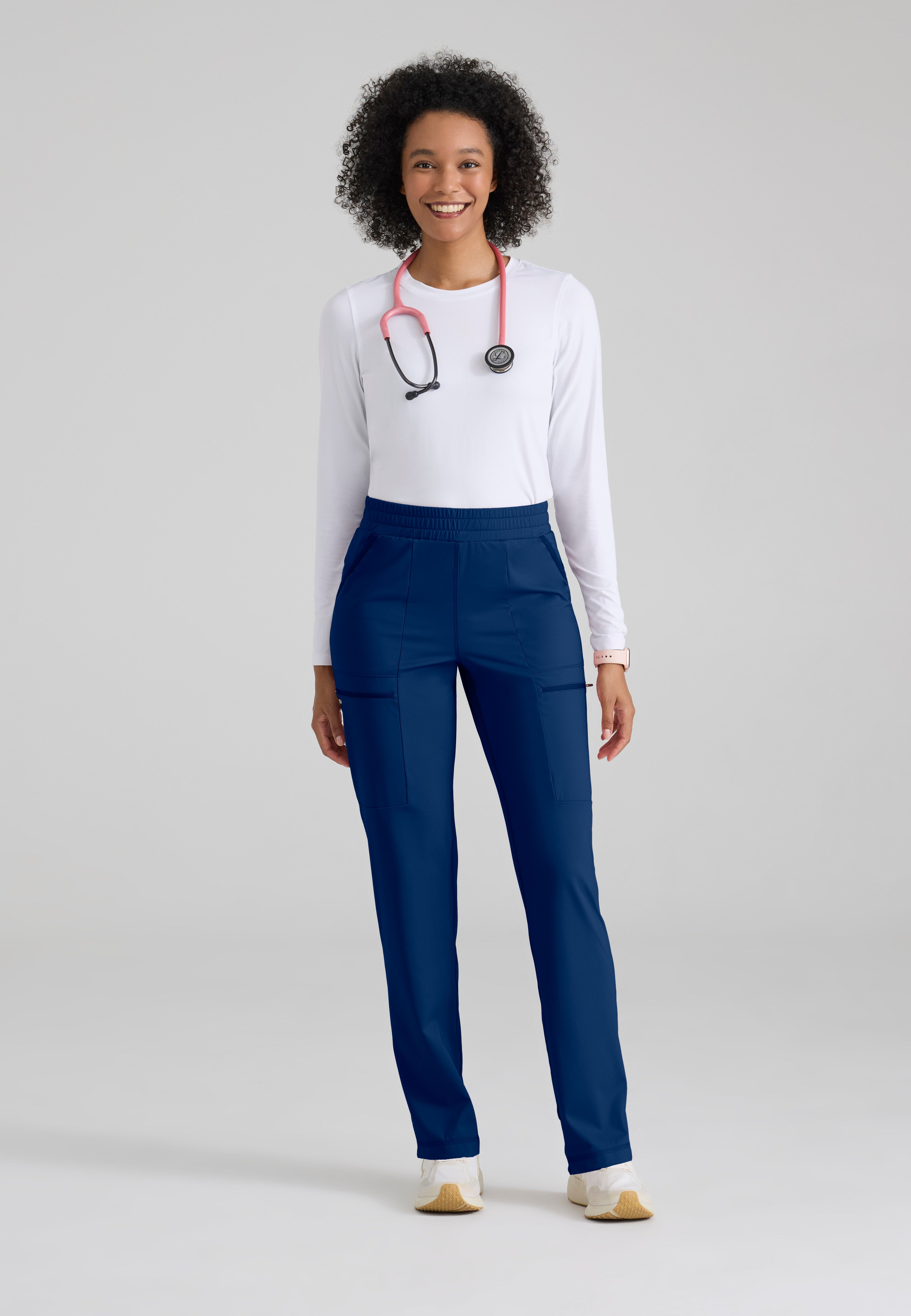 Full Body View of the Momentum Straight Leg Knit Pant in Indigo from Grey's Anatomy™ by Barco Knit Stretch