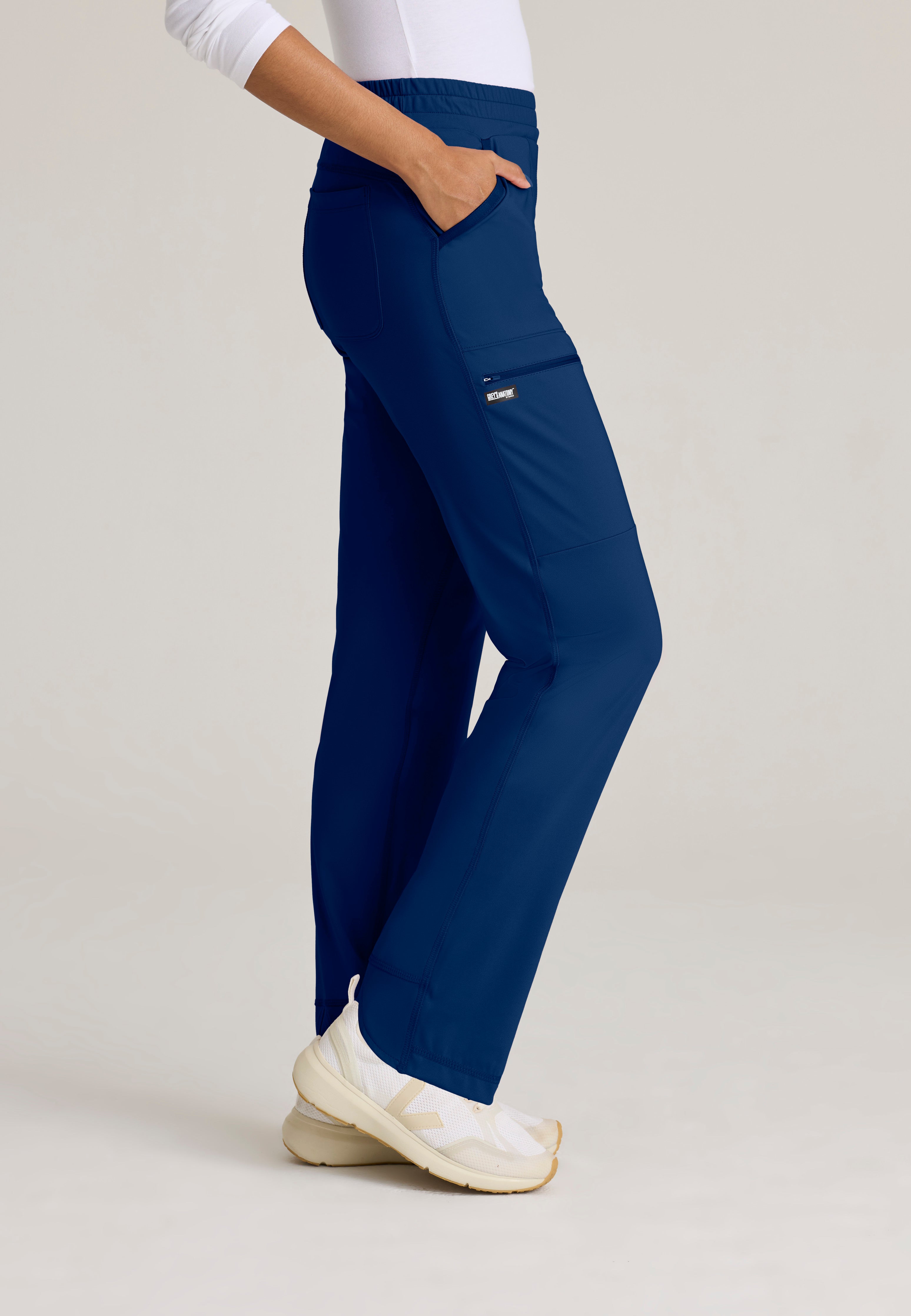Side View of the Momentum Straight Leg Knit Pant in Indigo from Grey's Anatomy™ by Barco Knit Stretch