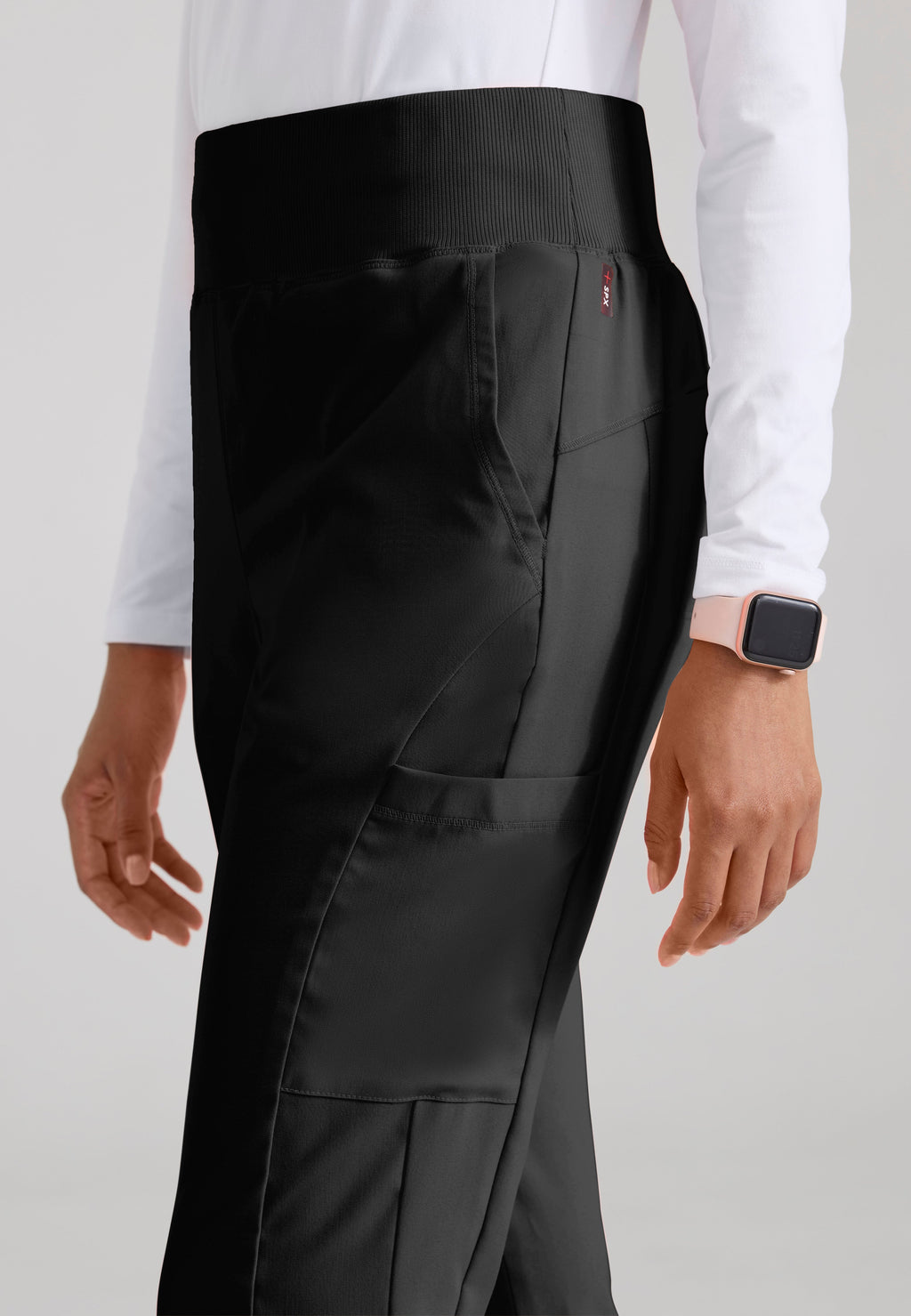 Detail Shot of the Renee 6-Pocket Cargo Knit Scrub Pant in Black from Grey's Anatomy™ by Barco Spandex Stretch