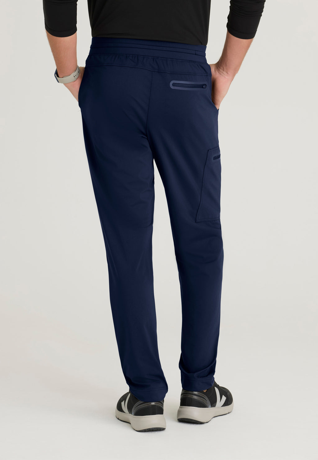 Back View of the Focus 4-Pocket Slim Straight Knit Pant in Indigo from Grey's Anatomy™ by Barco Knit Stretch