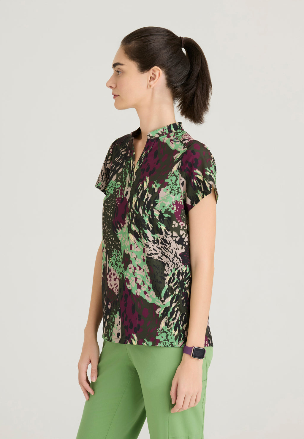 Side View of the Avery 2-Pocket Banded Collar Top from Grey's Anatomy™ by Barco Spandex Stretch
