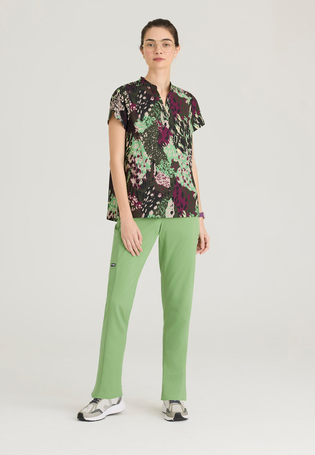 Full Body View of the Avery 2-Pocket Banded Collar Top in Sweet Basil from Grey's Anatomy™ by Barco Spandex Stretch