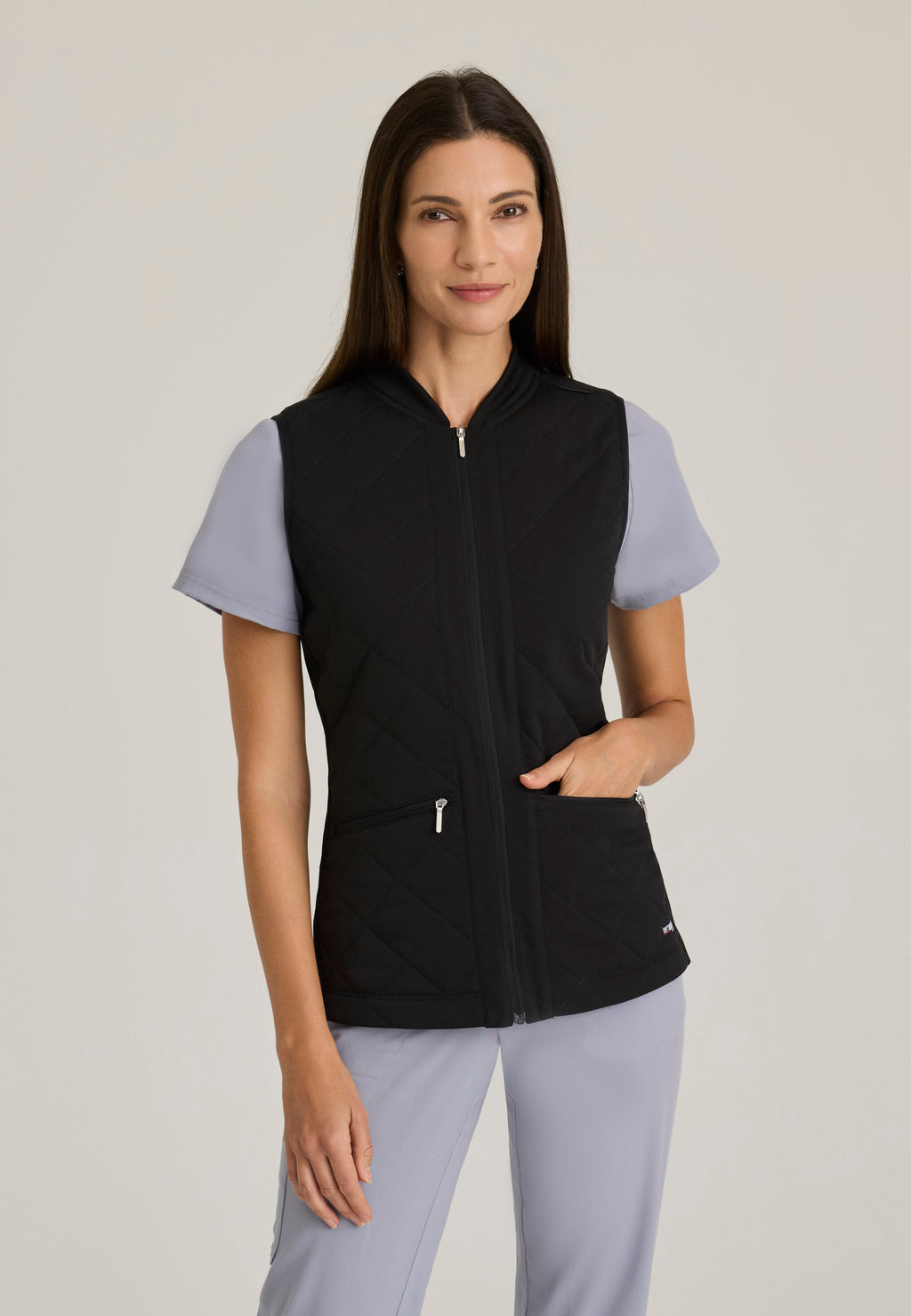 Front View of the Cristina 2-Pocket Quilted Scrub Vest in Black from Grey's Anatomy™ by Barco Spandex Stretch