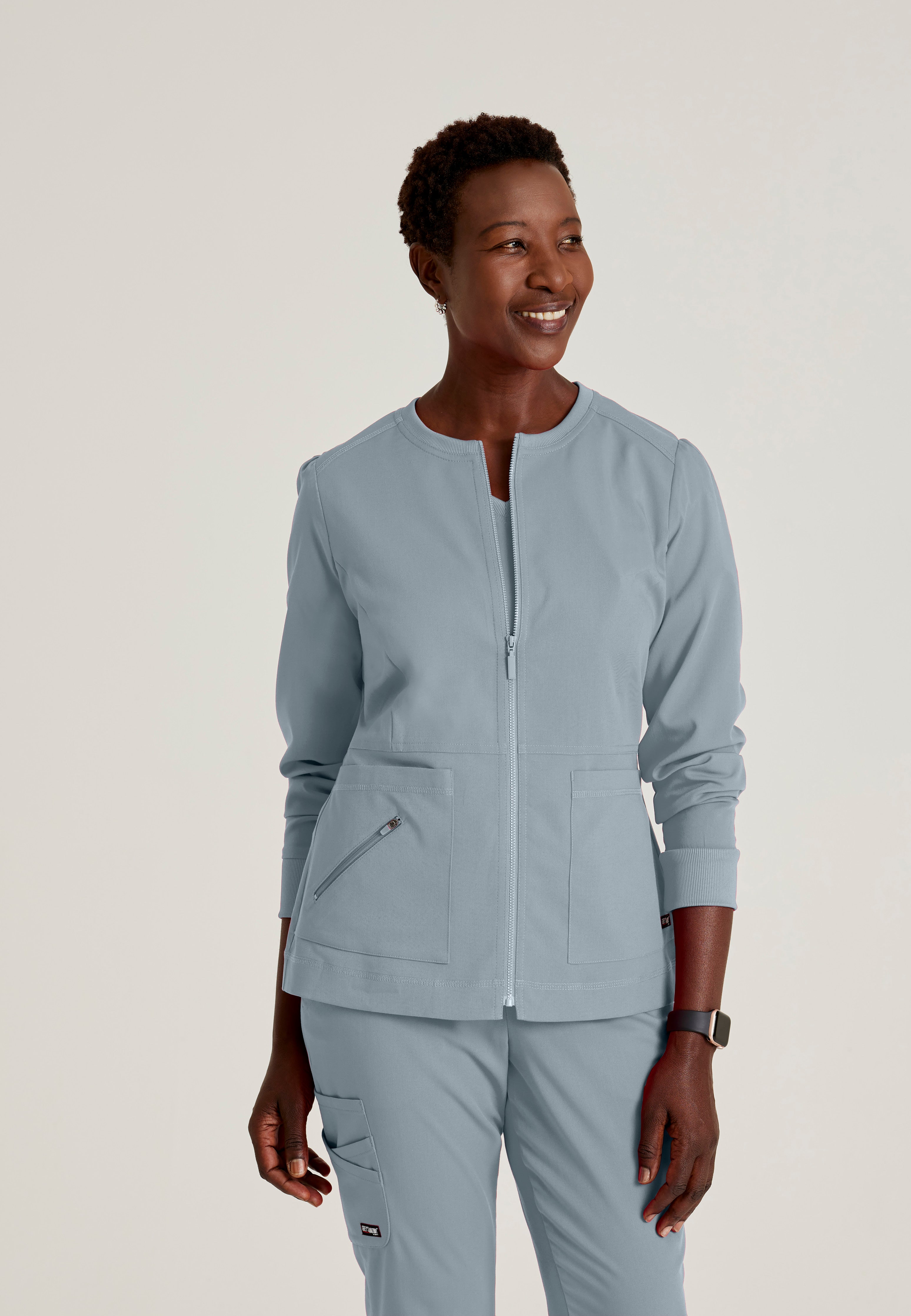 Front View of the Millie 3-Pocket Crewneck Scrub Jacket in Moonstruck from Grey's Anatomy™ by Barco Spandex Stretch