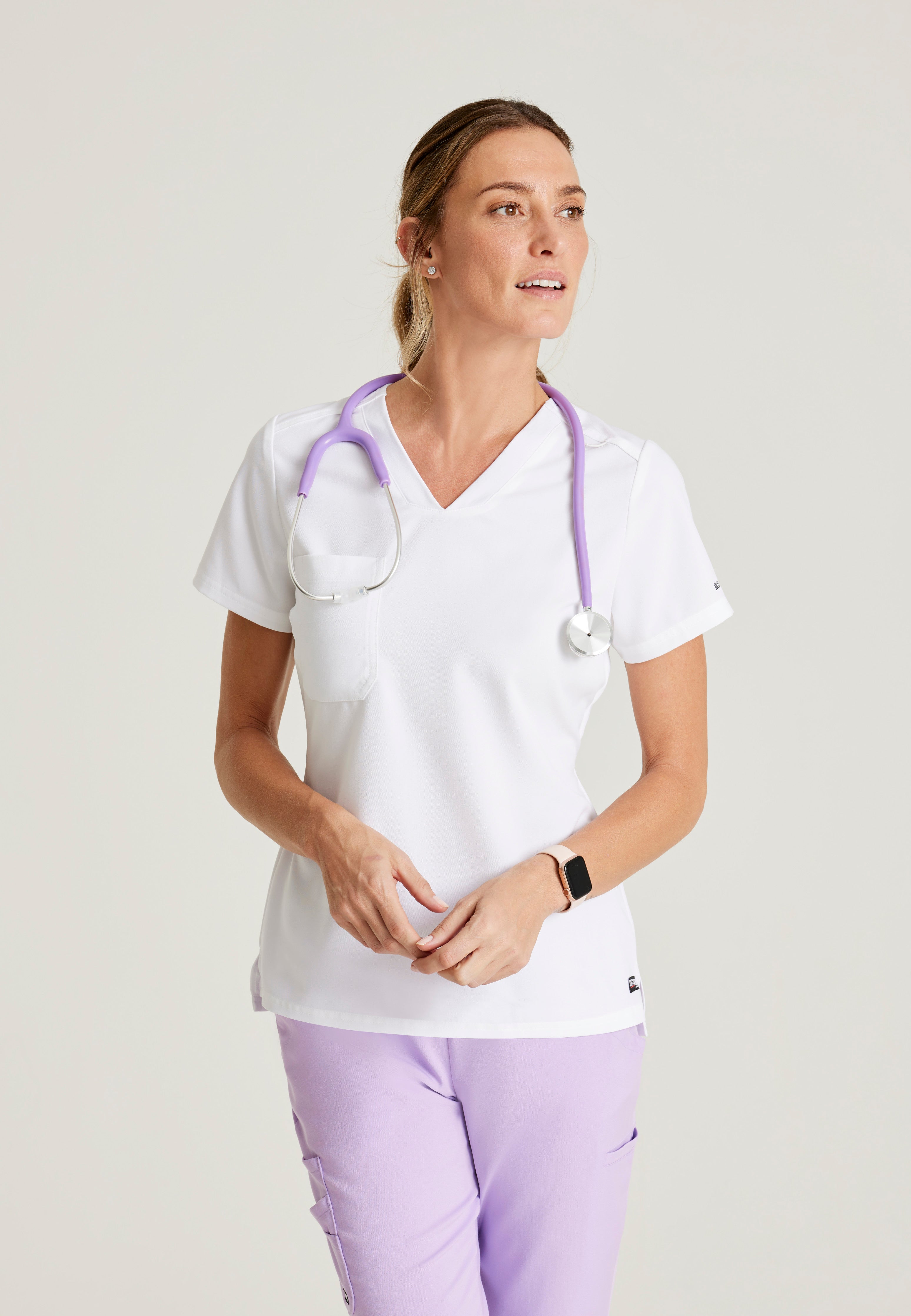 Front View of the Bree 1-Pocket Tuck-In Scrub Top in White from Grey's Anatomy™ by Barco Spandex Stretch