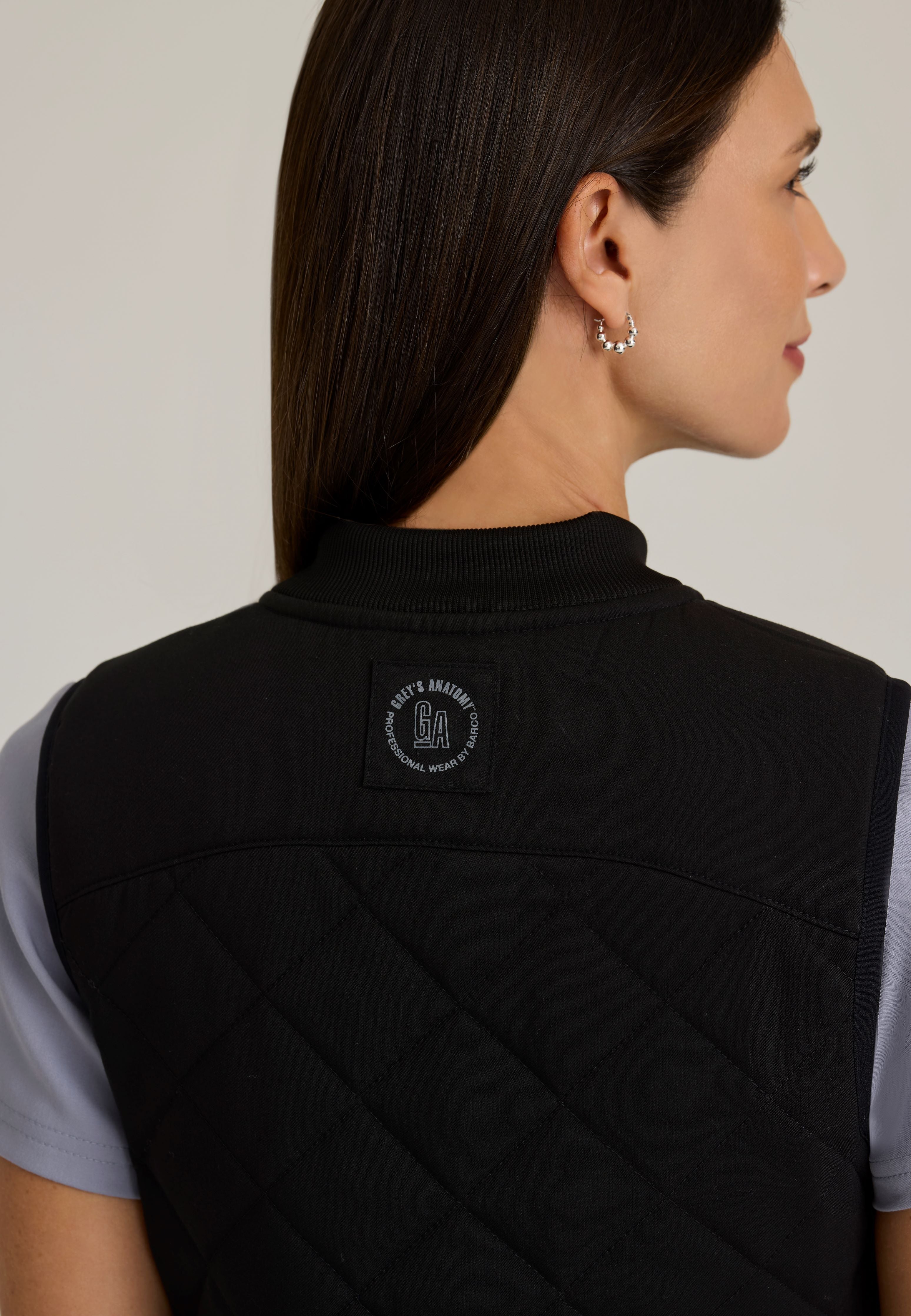 Detail Shot of the Cristina 2-Pocket Quilted Scrub Vest in Moonstruck from Grey's Anatomy™ by Barco Spandex Stretch