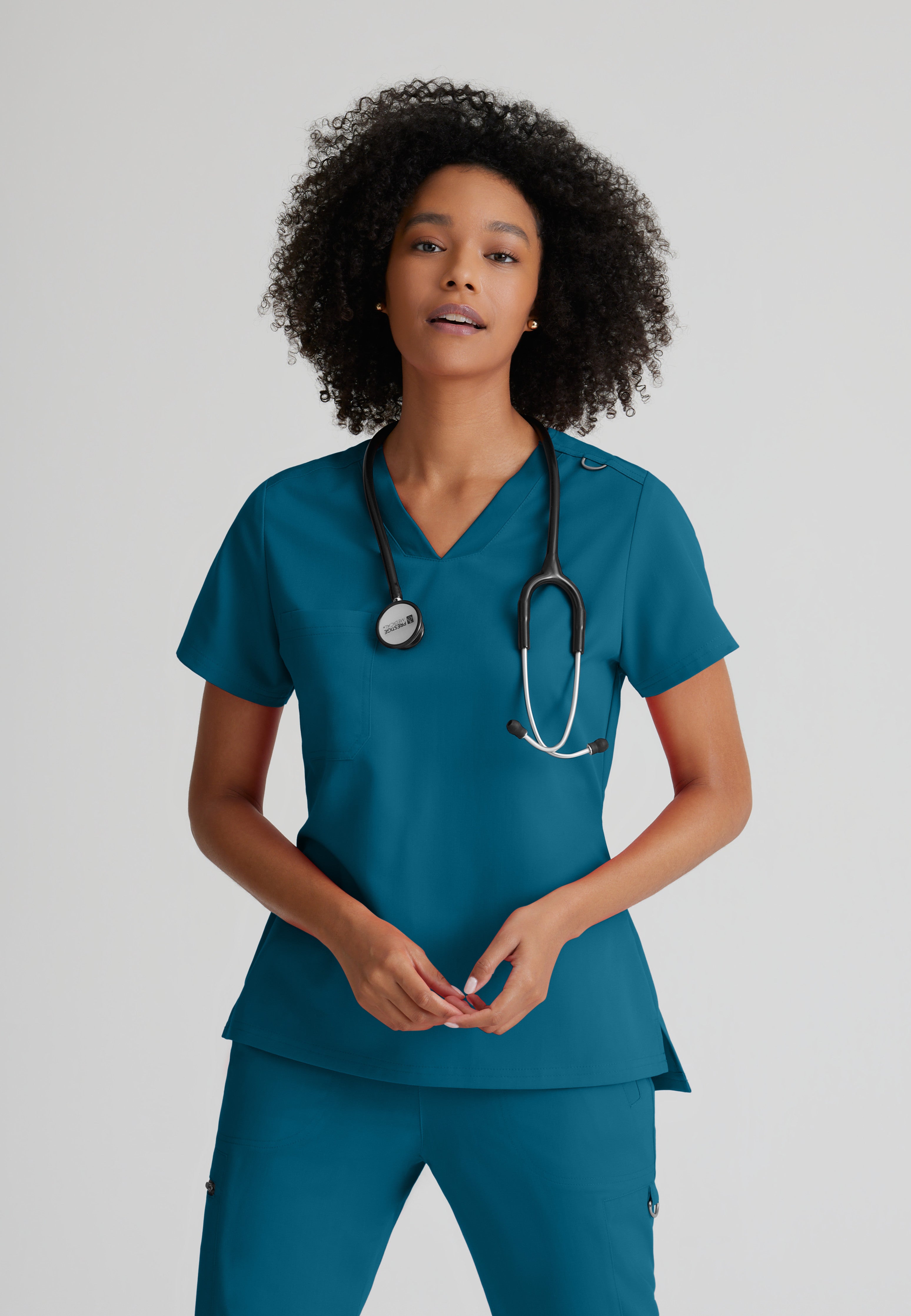 Front View of the Bree 1-Pocket Tuck-In Scrub Top in Bahama from Grey's Anatomy™ by Barco Spandex Stretch