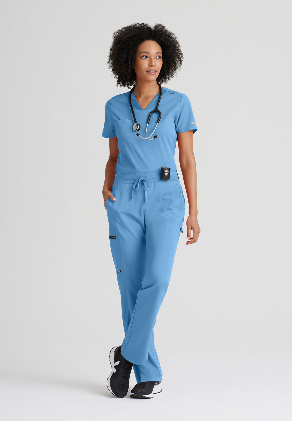 Full Body View of the Bree 1-Pocket Tuck-In Scrub Top in Ciel Blue from Grey's Anatomy™ by Barco Spandex Stretch