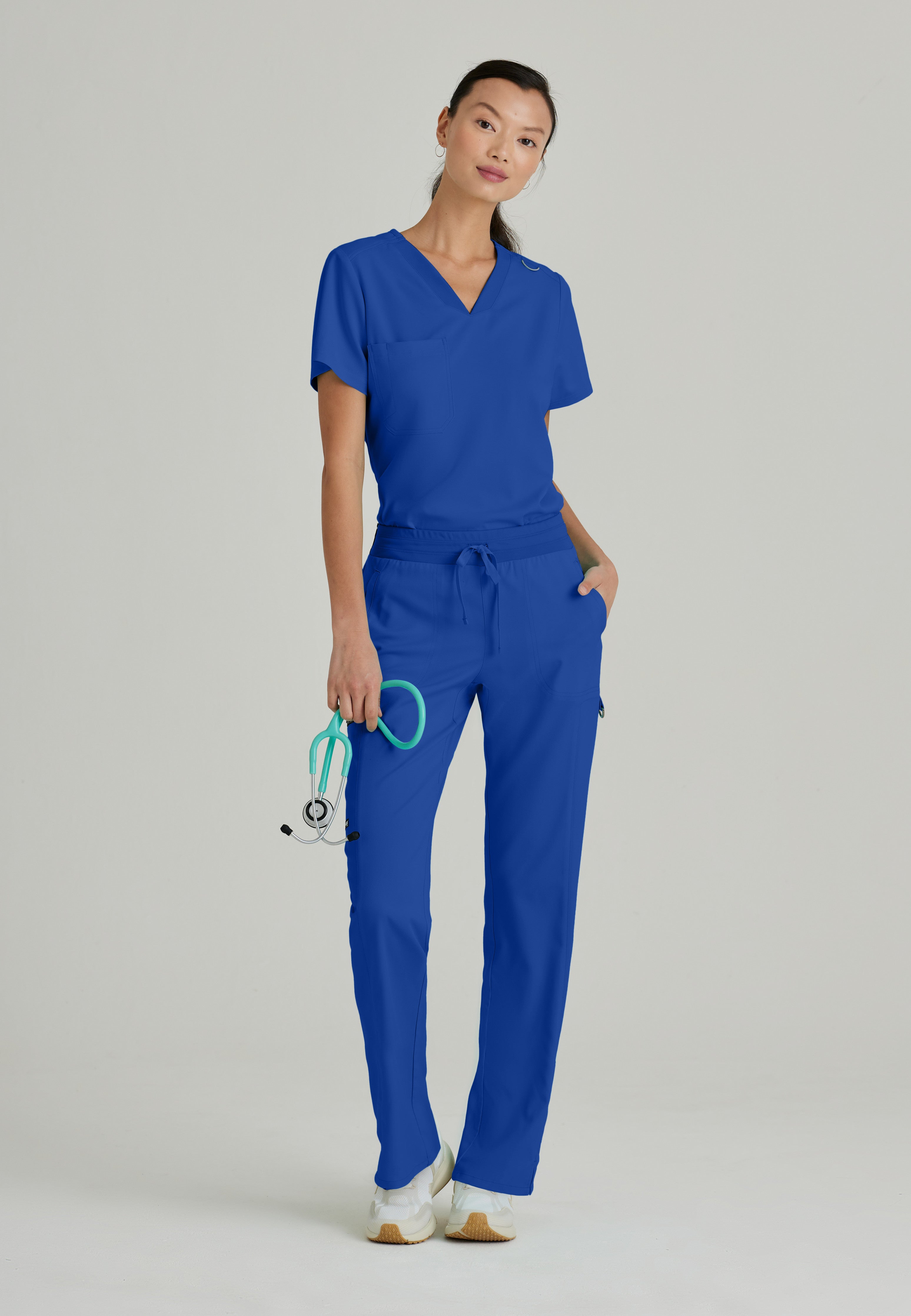 Full Body View of the Bree 1-Pocket Tuck-In Scrub Top in Galaxy from Grey's Anatomy™ by Barco Spandex Stretch