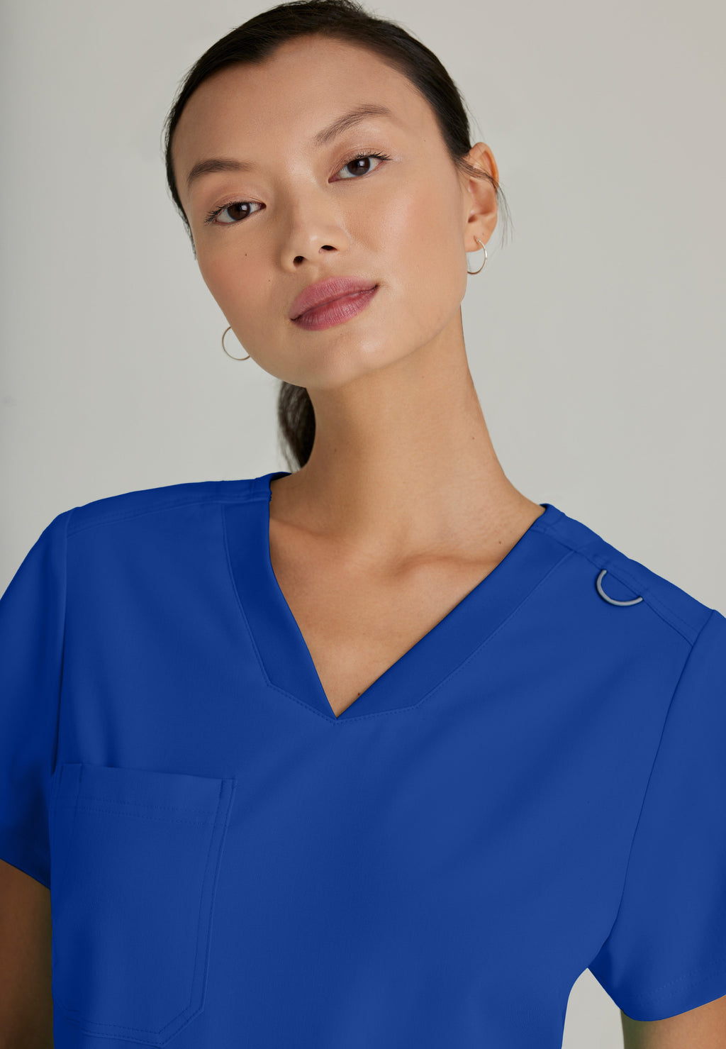 Back View of the Bree 1-Pocket Tuck-In Scrub Top in Galaxy from Grey's Anatomy™ by Barco Spandex Stretch