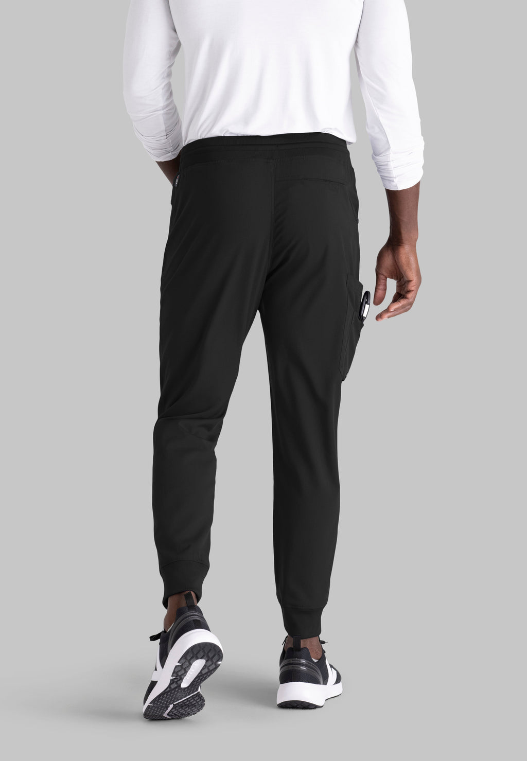 Grey's Anatomy Spandex-Stretch Men’s black Zip-Fly 5-Pocket Jogger Scrub Pant. Elastic waistband with drawstring. Wrinkle-resistant, easy care fabric. 