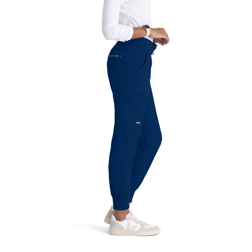 Grey's Anatomy Spandex-Stretch Women’s indigo Double Cargo Jogger Scrub Pants with Elastic Waistband. 7 pockets with ribbed waistband and cuffs.